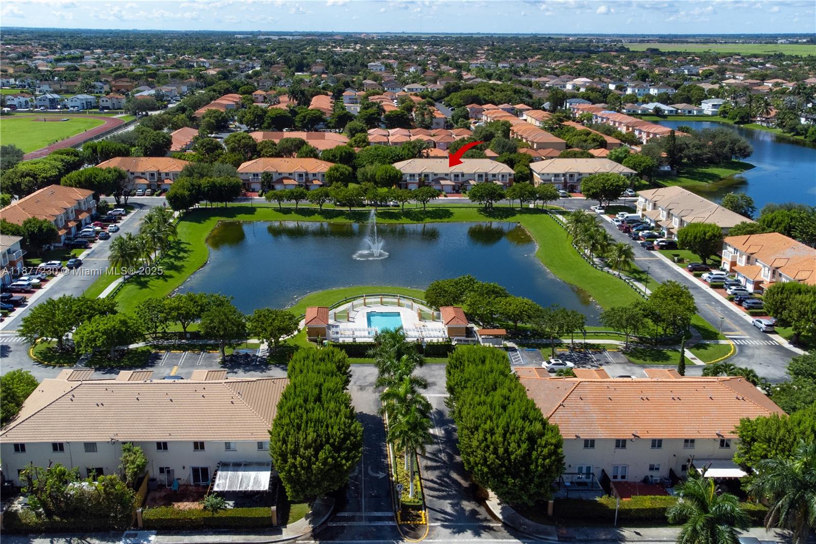 16256 Southwest 57th Lane Miami, FL 33193 - Photo 5 of 32 an aerial view of residential houses with outdoor space and lake view