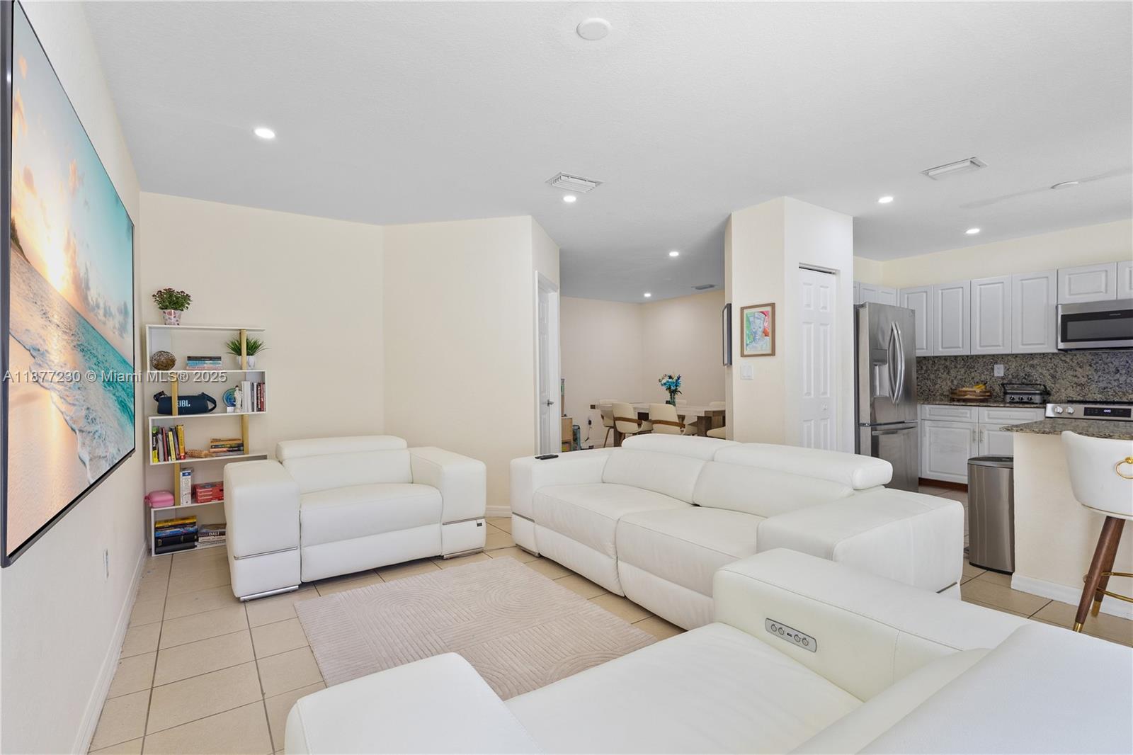 16256 Southwest 57th Lane Miami, FL 33193 - Photo 10 of 32 a living room with furniture and a large window
