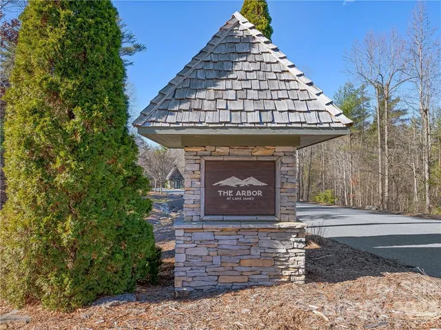 a view of front door of house with stairs
