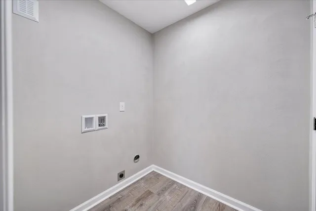 a view of a house with a yard and deck