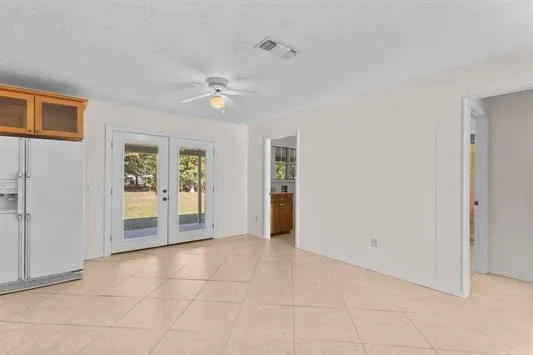 a view of an empty room with a bathroom