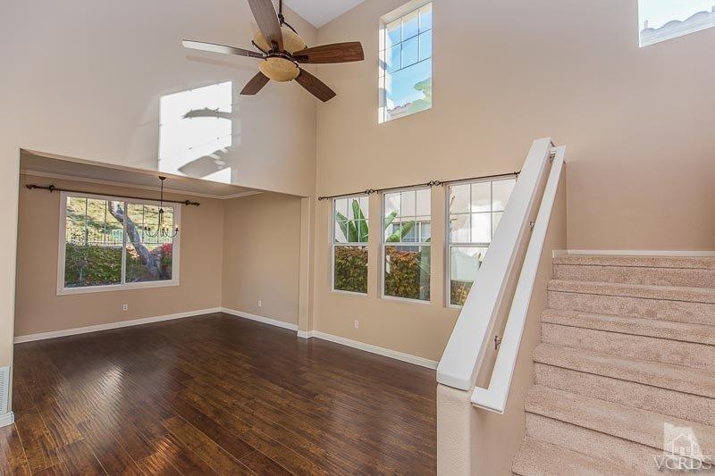 524 Shadow Lane Simi Valley, CA 93065 - Photo 6 of 40 a view of an empty room with wooden floor and a window