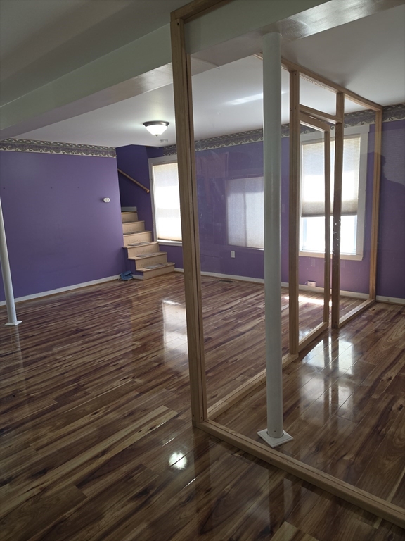 44-th 19th Street, Unit REAR Lowell, MA 01850 - Photo 9 of 13 a view of a hallway with an entryway