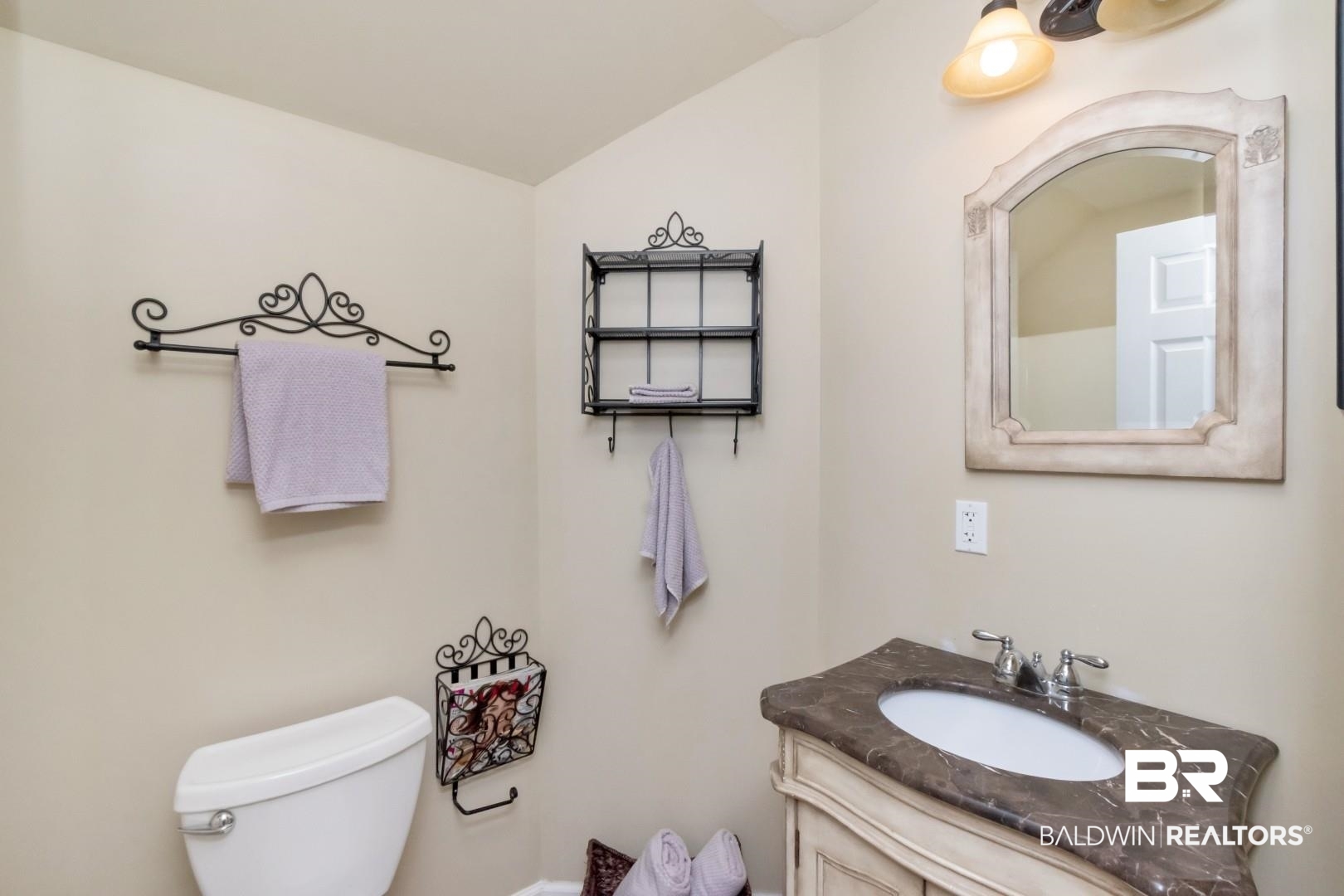 9905 Carnoustie Court Foley, AL 36535 - Photo 24 of 31 Bathroom featuring vanity and lofted ceiling