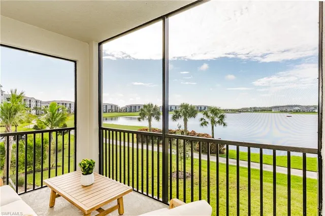 a balcony view with a lake view
