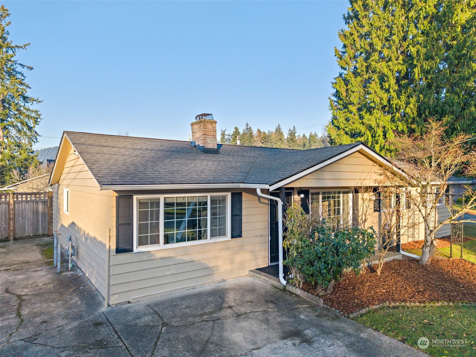 14610 Southeast 113th Street Renton, WA 98059 - Photo 2 of 34 a house view with a garden space