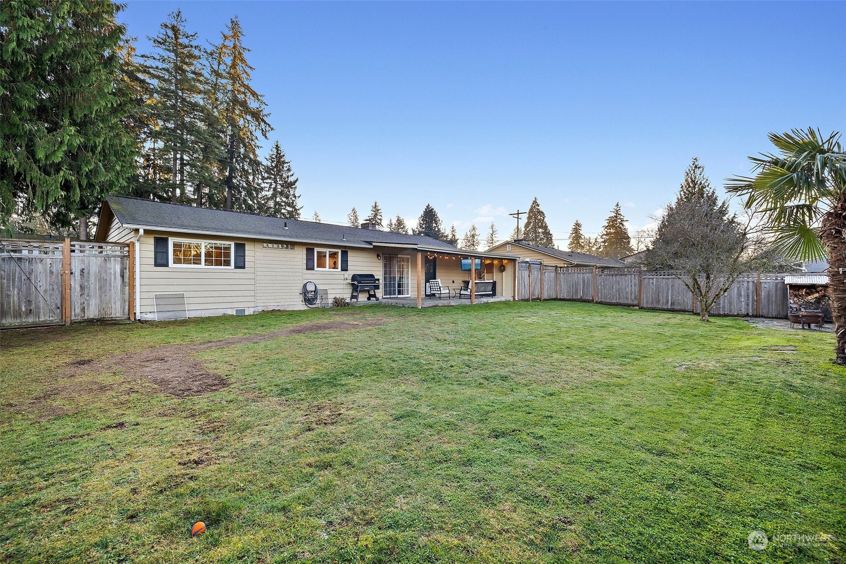 14610 Southeast 113th Street Renton, WA 98059 - Photo 31 of 34 a house view with a garden space