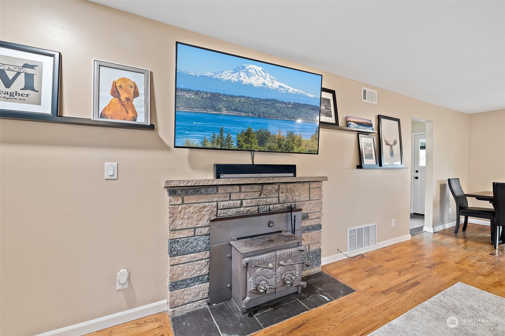 14610 Southeast 113th Street Renton, WA 98059 - Photo 8 of 34 a living room with furniture and a flat screen tv