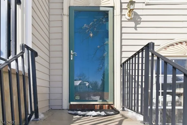 a view of a balcony with door