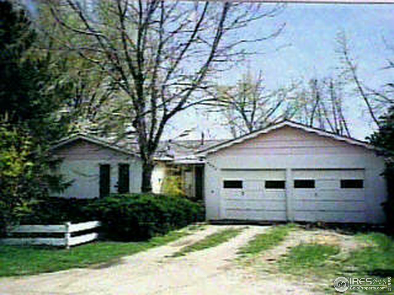 4062 Pleasant Ridge Road Boulder, CO 80301 - Photo 1 of 6 a front view of a house with a yard