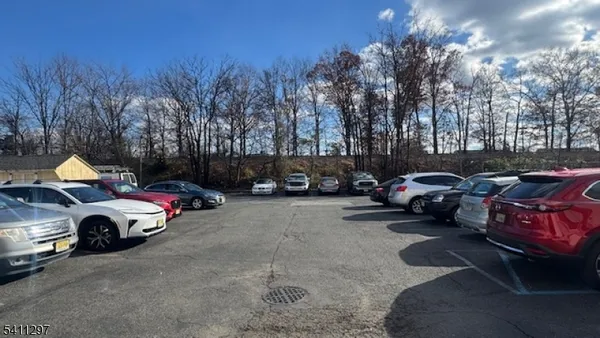 a car parked in front of a house