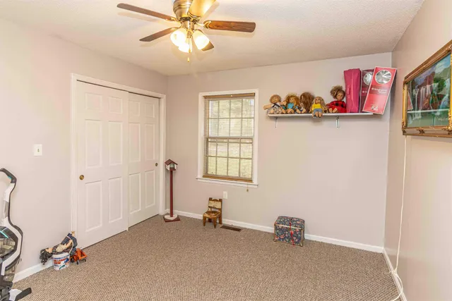 a view of swimming pool with a yard