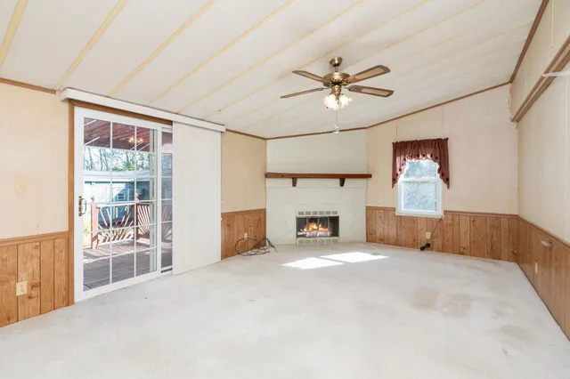 a kitchen with a refrigerator and a sink
