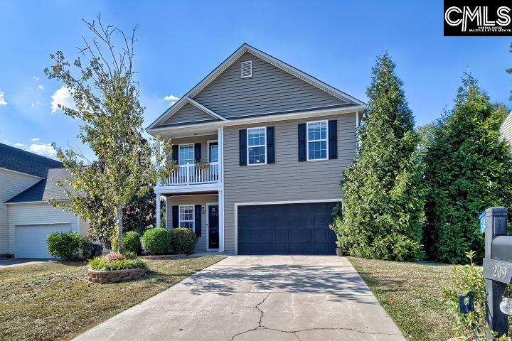 209 Eagle Pointe Drive Chapin, SC 29036 - Photo 3 of 40 a front view of a house with a yard