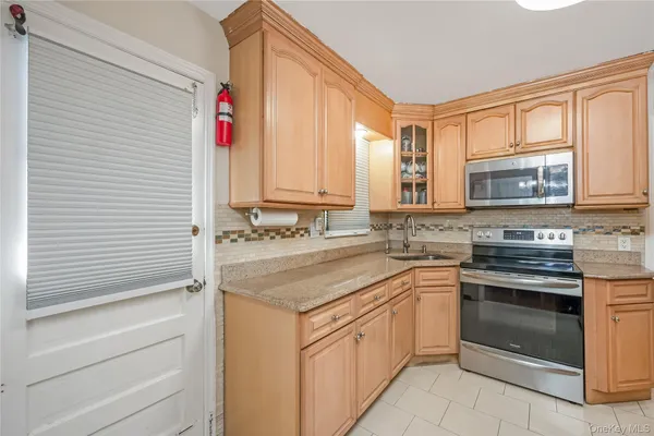 $1,199,000 | 67-22 166th Street | Flushing Heights