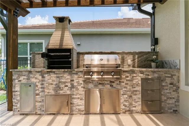a kitchen with a stove and cabinets