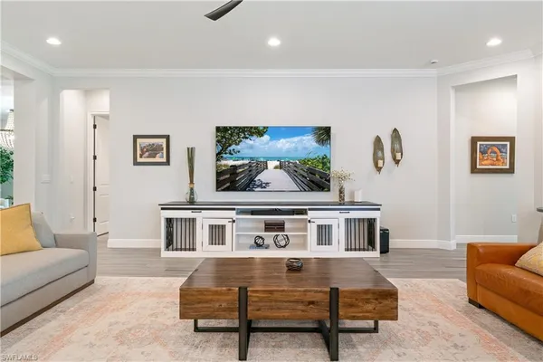 a living room with furniture and a rug