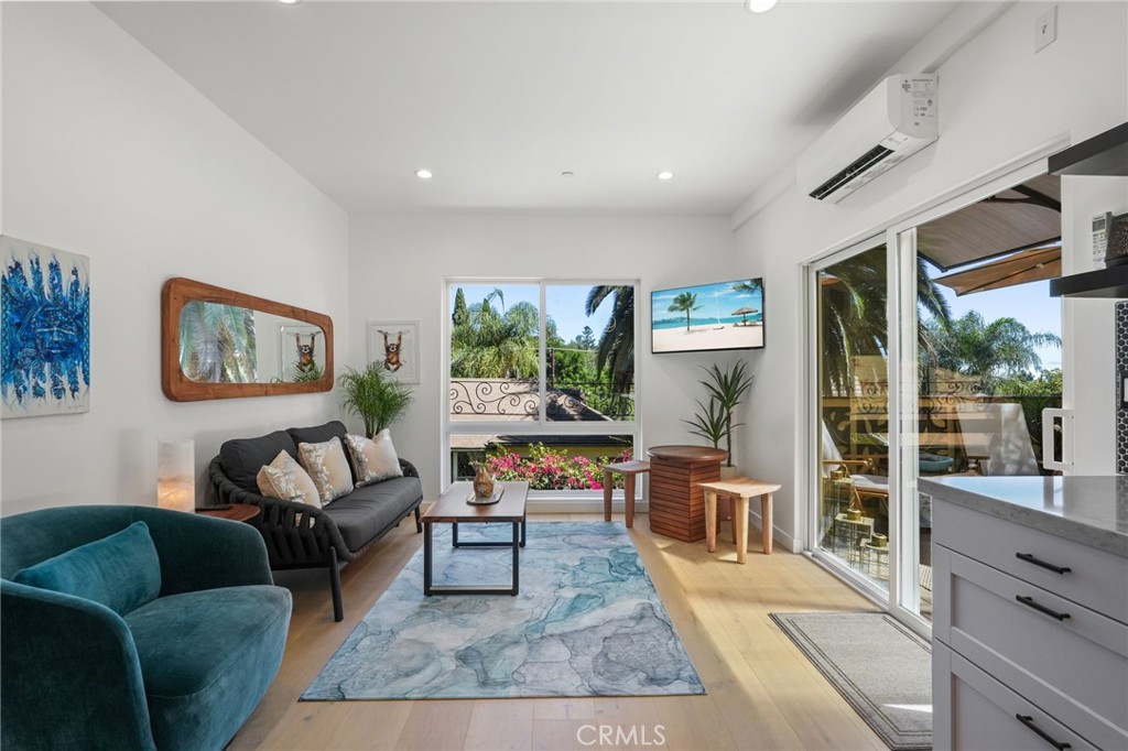 2258 Helios Drive Los Angeles, CA 90068 - Photo 1 of 27 a living room with furniture and a large window