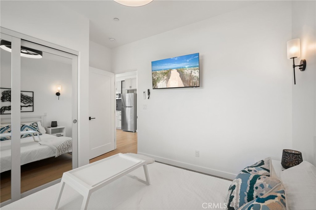 2258 Helios Drive Los Angeles, CA 90068 - Photo 8 of 27 a bedroom with a bed and a view of bathroom