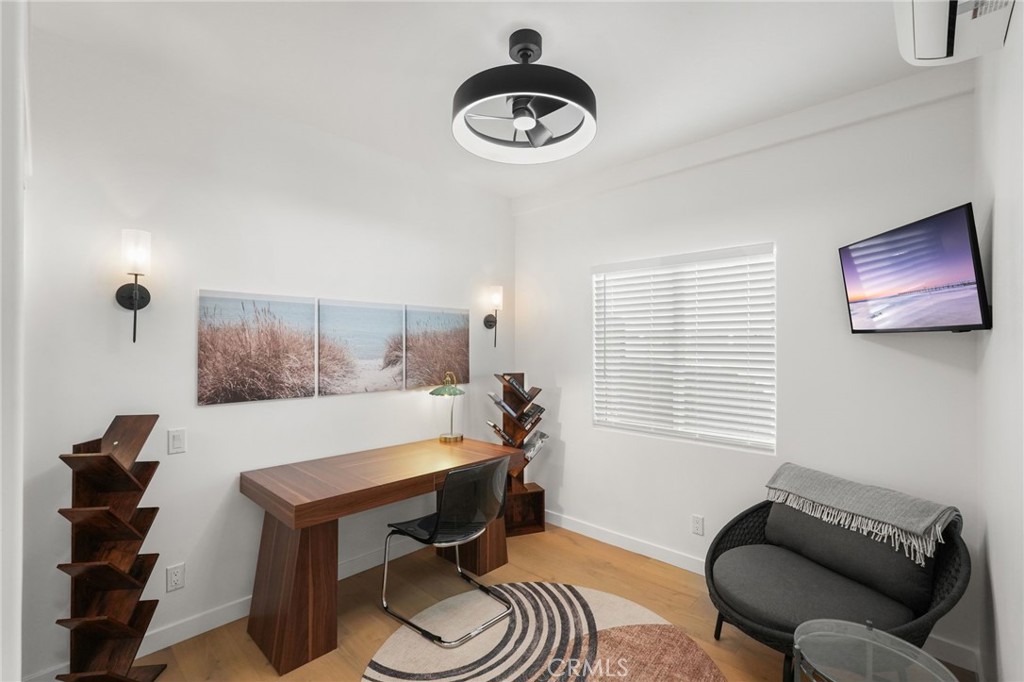 2258 Helios Drive Los Angeles, CA 90068 - Photo 10 of 27 a living room with furniture and a window
