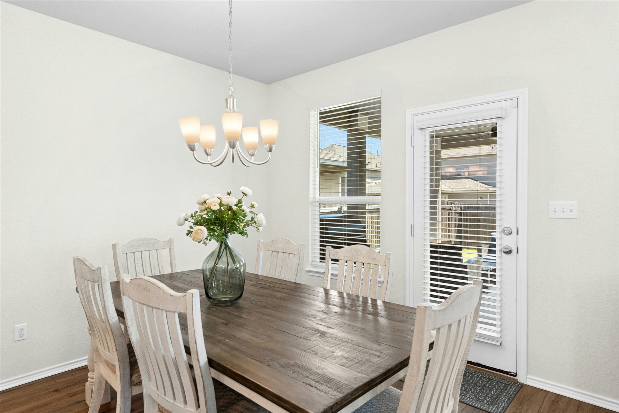 1124 Aronia Lane Georgetown, TX 78626 - Photo 11 of 31 a dining room with furniture and wooden floor