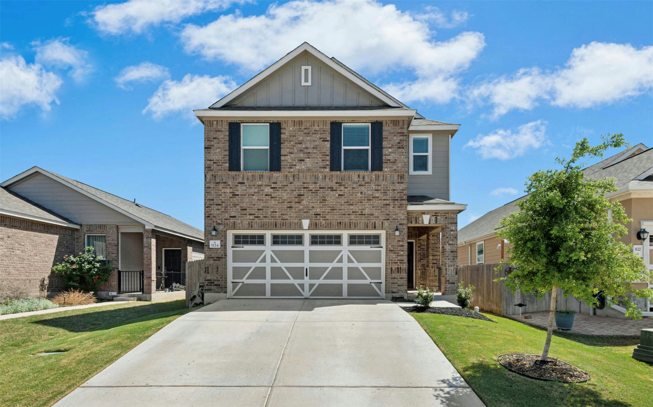 1124 Aronia Lane Georgetown, TX 78626 - Photo 2 of 31 a front view of a house with a yard