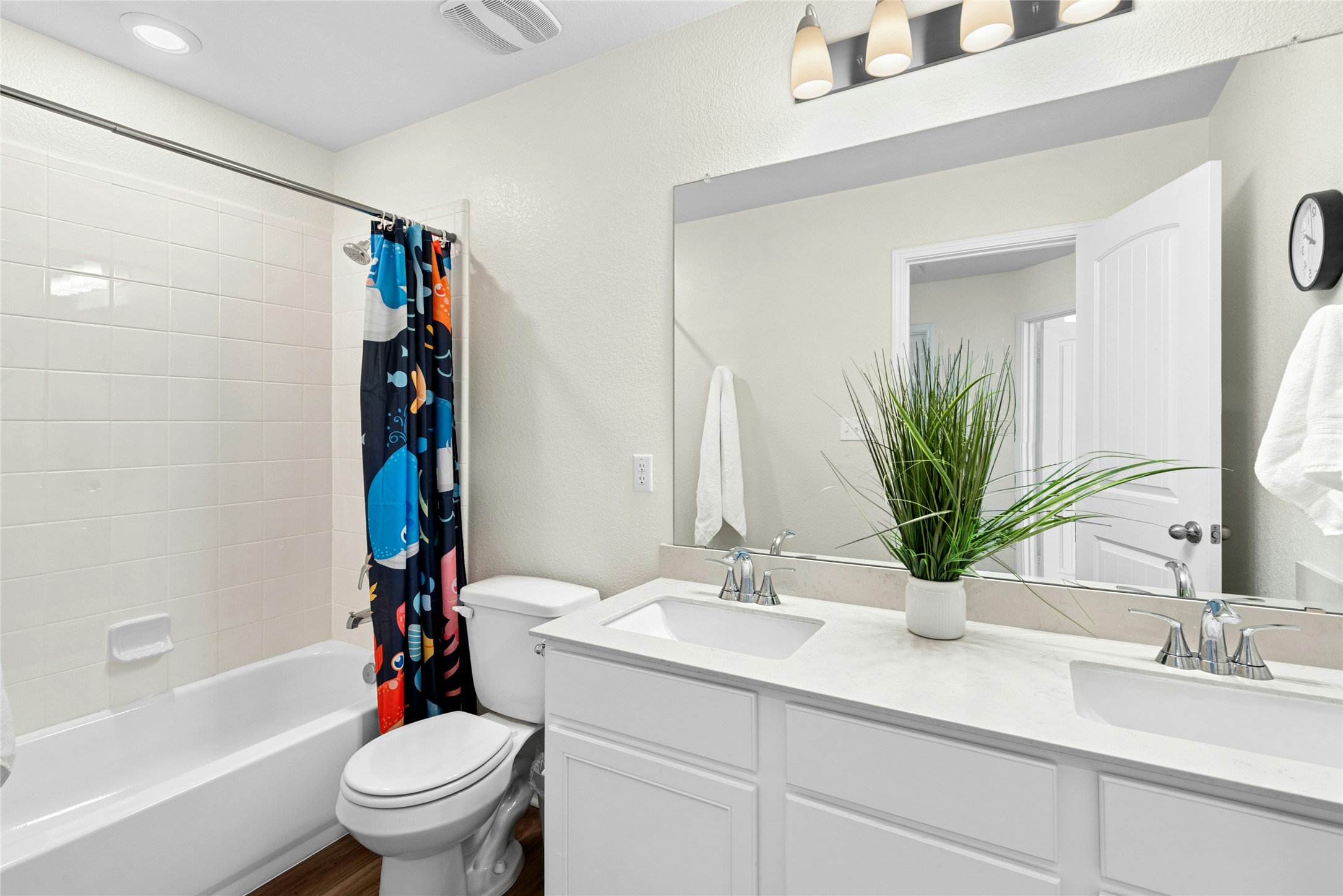 1124 Aronia Lane Georgetown, TX 78626 - Photo 24 of 31 a bathroom with a sink a toilet and a bathtub