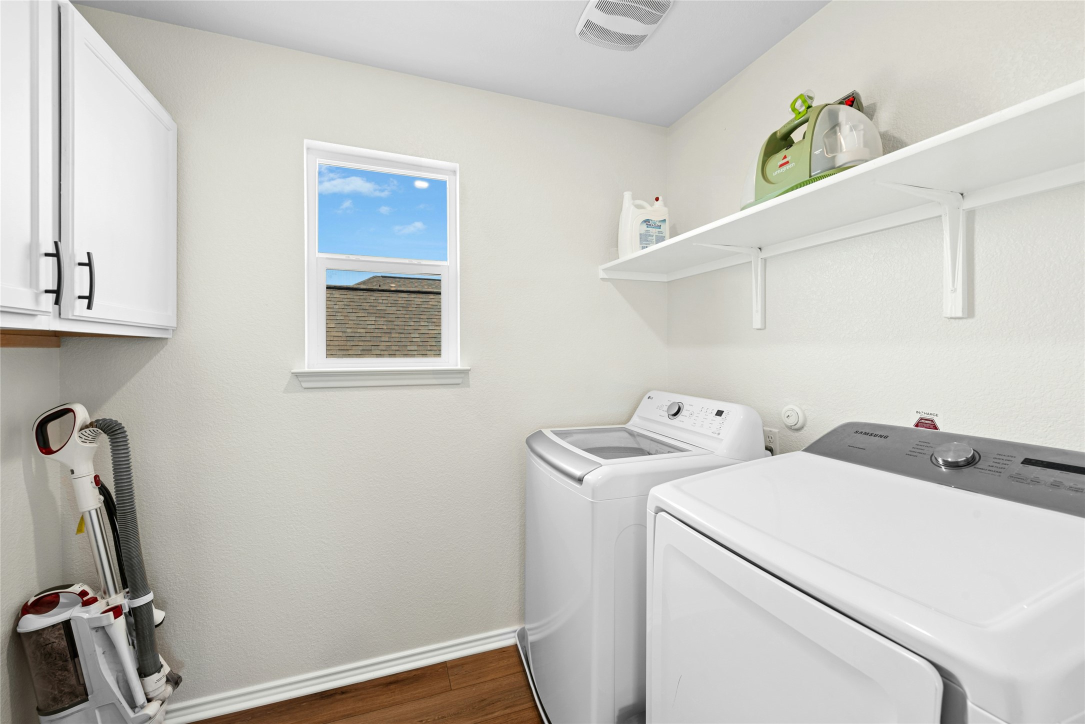 1124 Aronia Lane Georgetown, TX 78626 - Photo 25 of 31 a utility room with dryer and washer