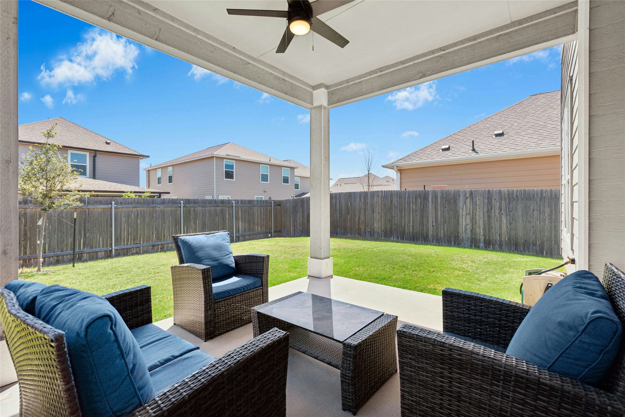 1124 Aronia Lane Georgetown, TX 78626 - Photo 26 of 31 a view of a patio with couches chairs and a fire pit