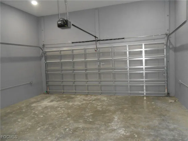 a view of front door and yard