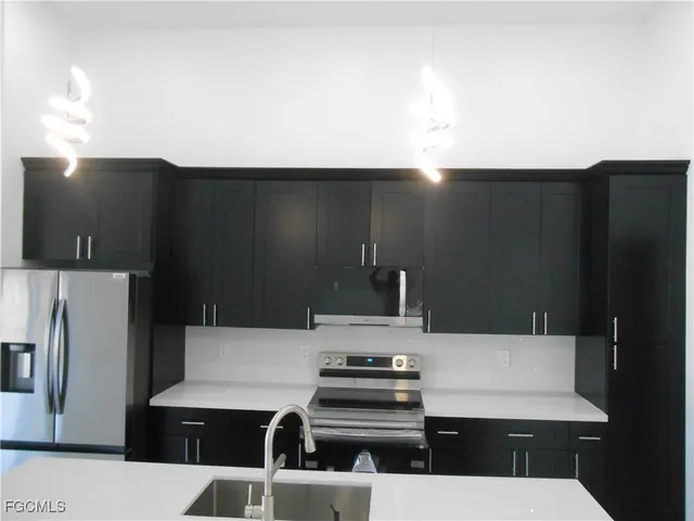 a view of a kitchen with a stove