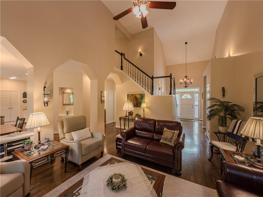 4284 Cedar Bluff Way Southwest Lilburn, GA 30047 - Photo 22 of 62 a living room with furniture and a flat screen tv