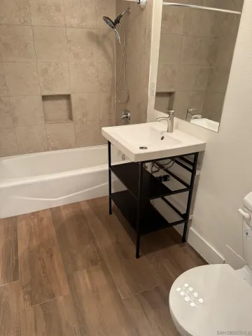 a bathroom with a sink and a bathtub