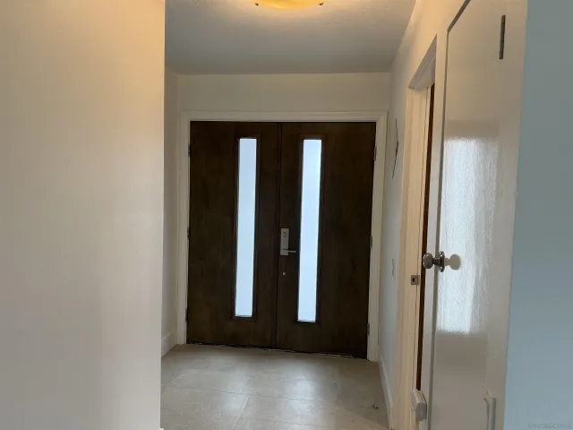 an entryway with a hallway