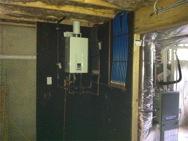 109 Chestnut Road Tyngsborough, MA 01879 - Photo 6 of 28 a close view of water heater room
