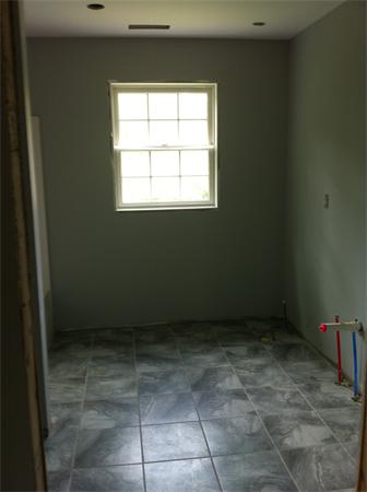 109 Chestnut Road Tyngsborough, MA 01879 - Photo 8 of 28 a view of an empty room with a window