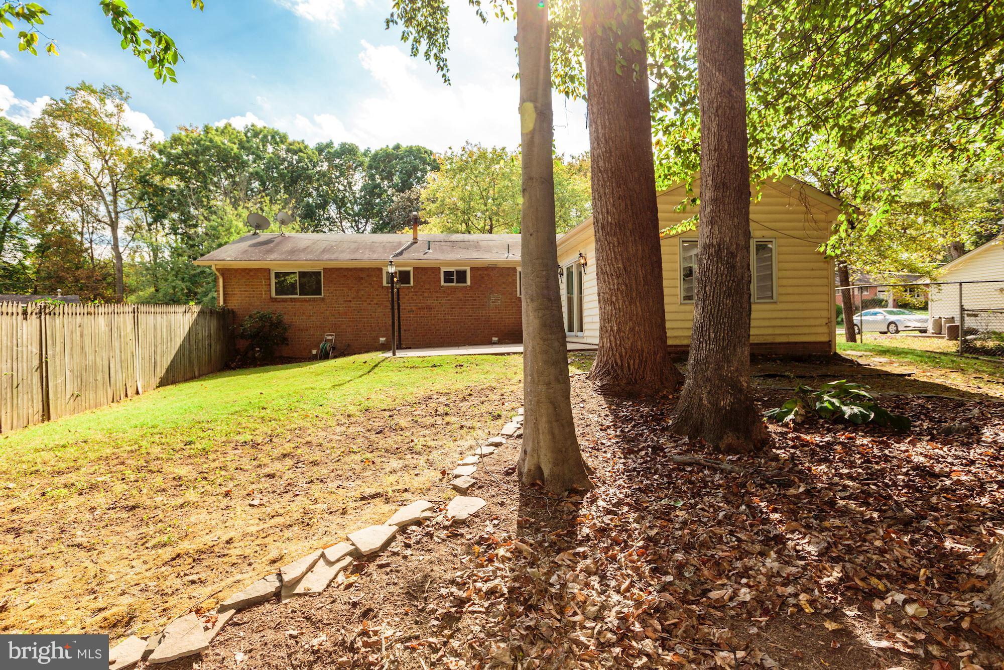8425 Thames Street Springfield, VA 22151 - Photo 29 of 30 a view of a house with a yard