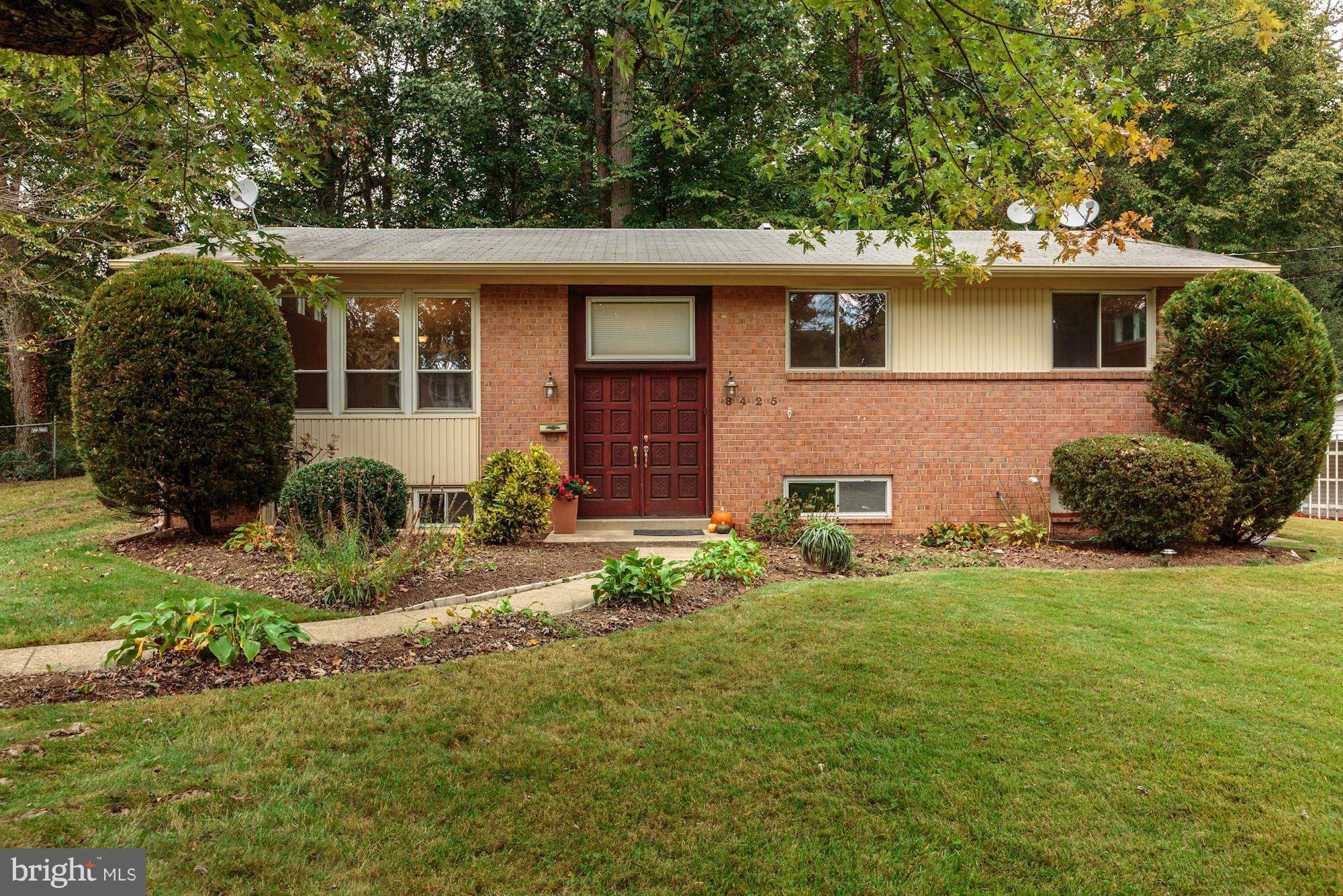 8425 Thames Street Springfield, VA 22151 - Photo 30 of 30 a front view of a house with garden