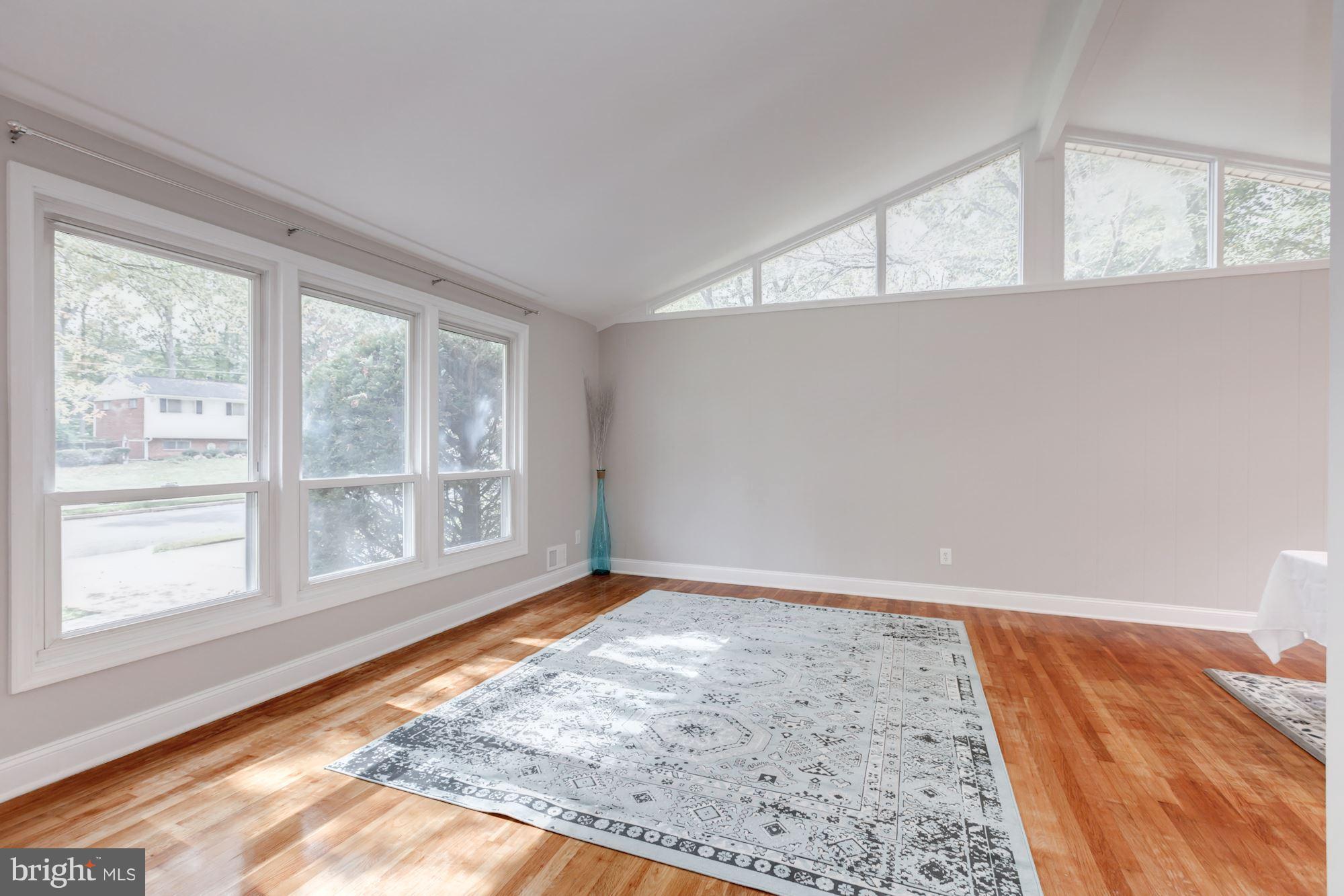 8425 Thames Street Springfield, VA 22151 - Photo 4 of 30 a view of an empty room and window