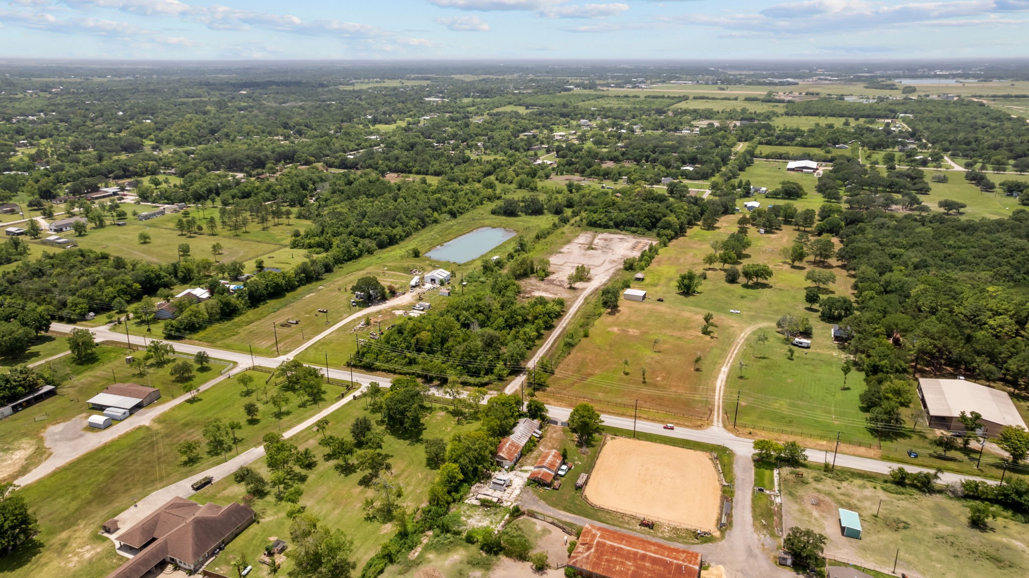1403 Algoa-Friendswood Road Alvin, TX 77511 - Photo 19 of 21 an aerial view of residential houses with outdoor space