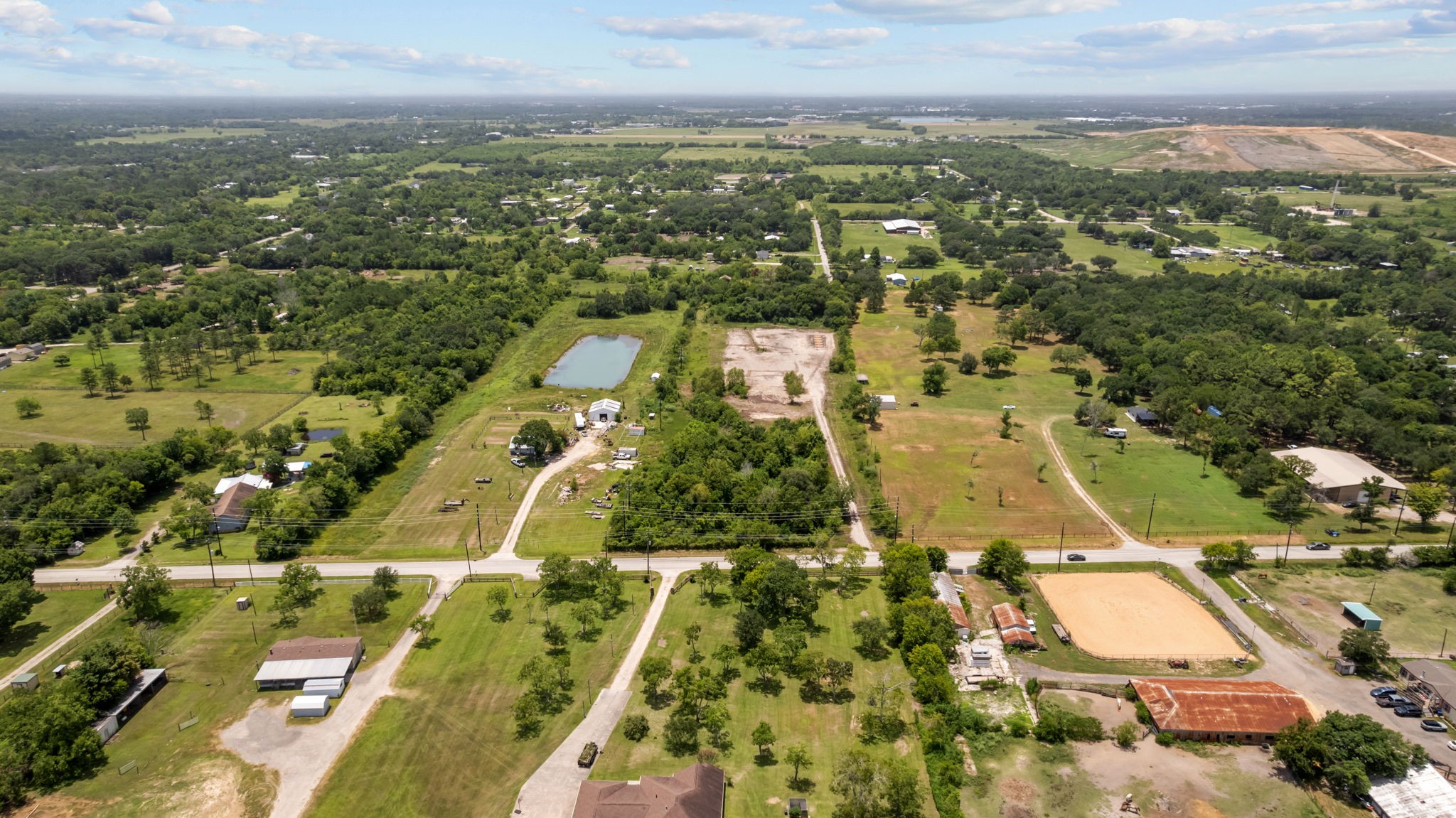 1403 Algoa-Friendswood Road Alvin, TX 77511 - Photo 20 of 21 an aerial view of residential houses with outdoor space