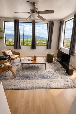 a kitchen with stainless steel appliances granite countertop a sink dishwasher stove and refrigerator