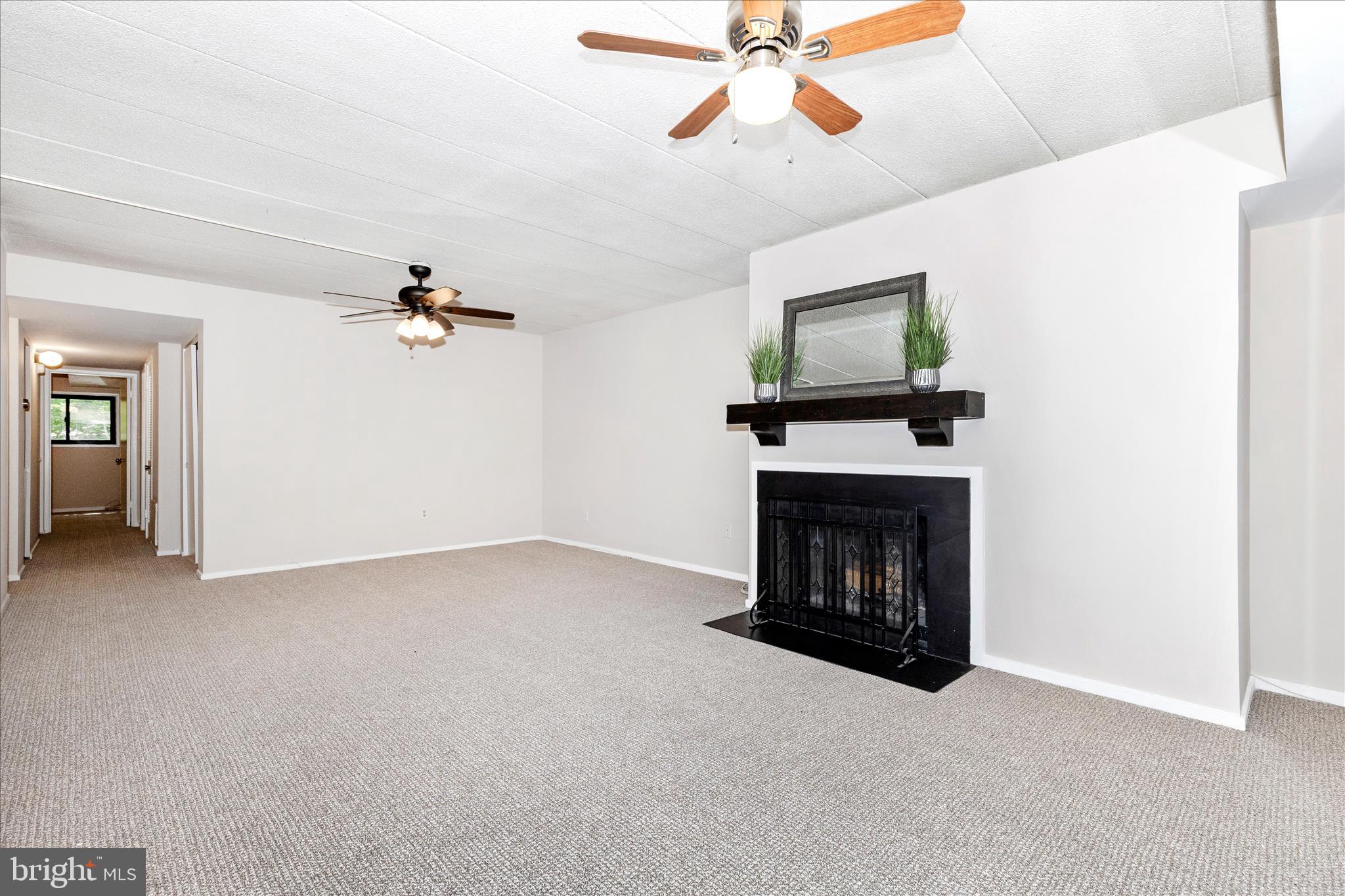 5713 Harpers Farm Road, Unit C Columbia, MD 21044 - Photo 11 of 42 Wood burning fireplace