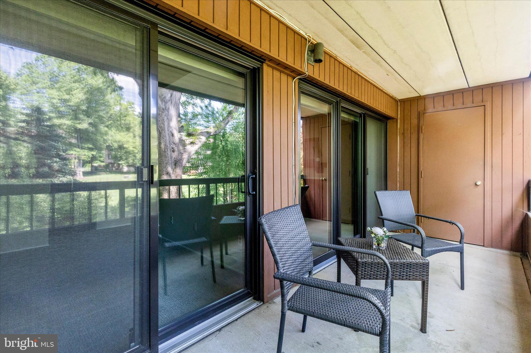 5713 Harpers Farm Road, Unit C Columbia, MD 21044 - Photo 9 of 42 Dual Andersen sliding glass doors