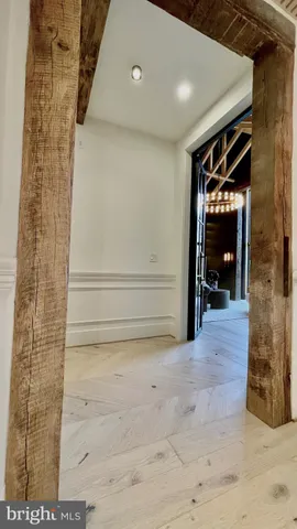 a kitchen with stainless steel appliances granite countertop a stove a sink and a wooden floors