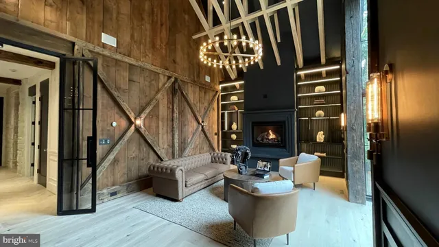 a kitchen with kitchen island granite countertop a stove a sink a refrigerator and island