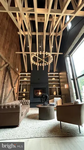 a lobby with furniture and window