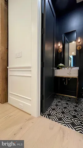 a view of a house with backyard porch and sitting area