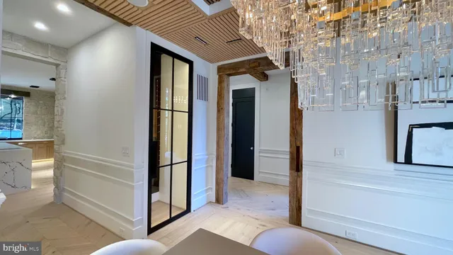 a kitchen with a table and chairs