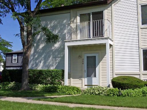 248 Inverrary Lane, Unit 248 Deerfield, IL 60015 - Photo 1 of 1 a view of a house with brick walls and potted plants
